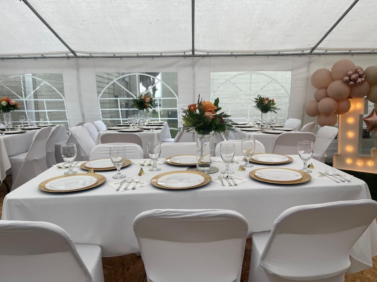 Beautiful garden party setup with tent and decorations